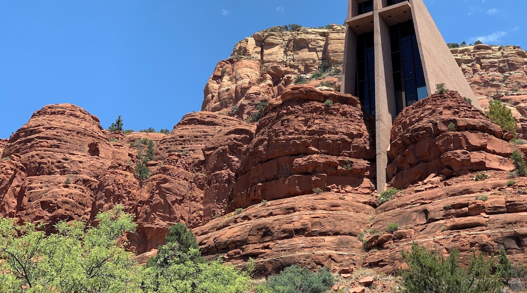 Located directly on the road. Inside is gorgeous. Must see in Sedona.