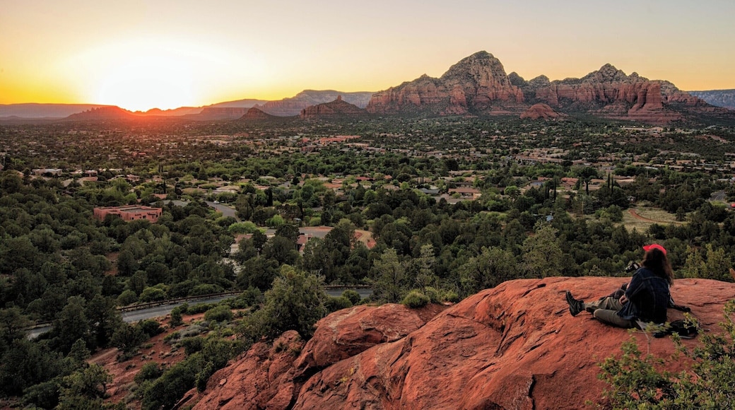 Sunset at Airport Mesa is a must if in Sedona. I recommend hiking to the knoll below the mesa for a view with fewer people. The mesa is accessible by car and attracts large numbers of people. You have to hike to the knoll and far fewer people congregate here.