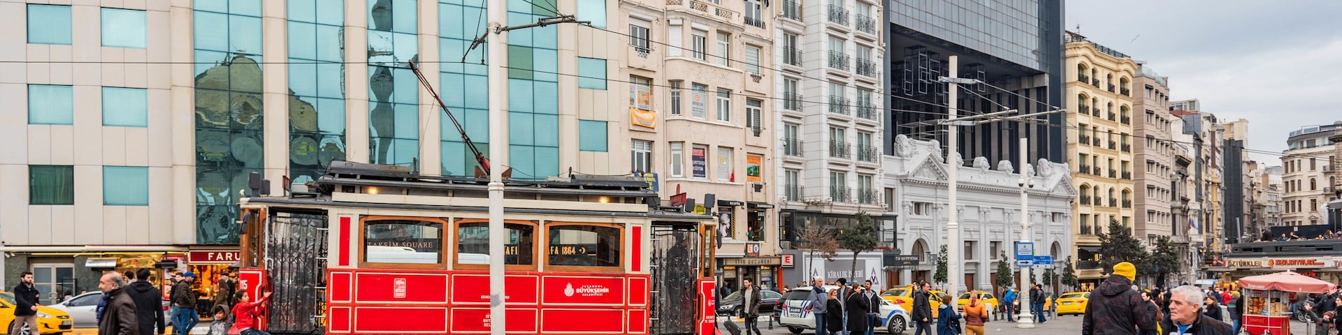Taksim which includes street scenes, railway items and a city
