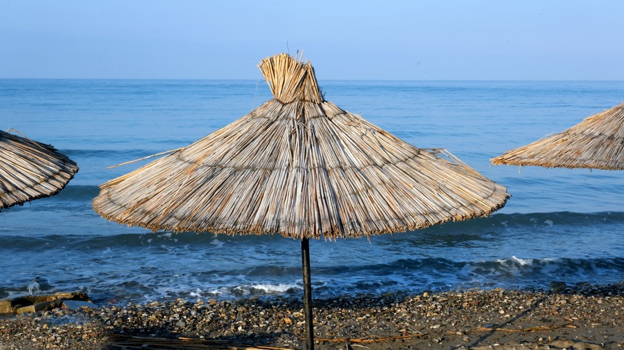 Umbrellas on the aegean sea coast