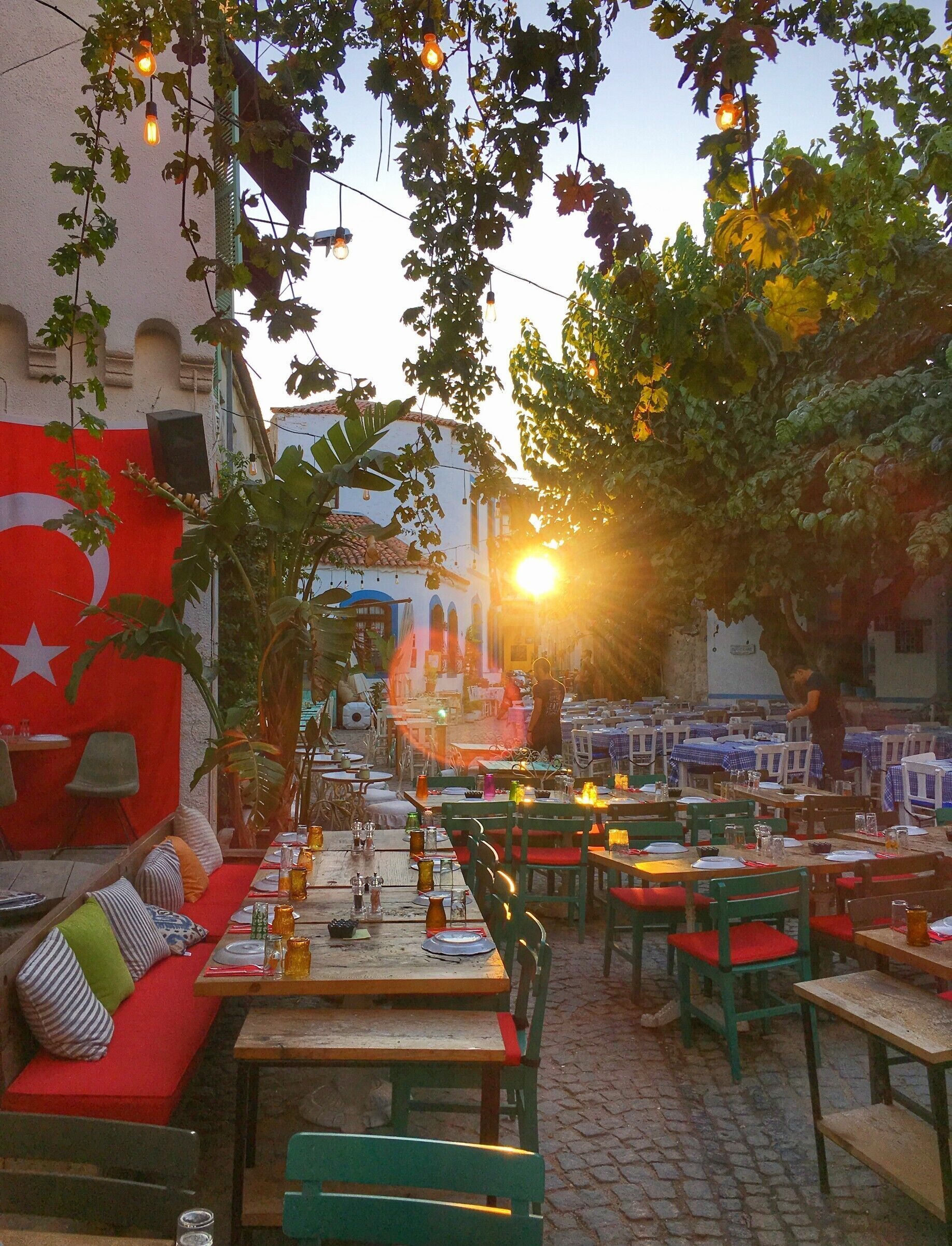 As sun begins to set, the restaurants in Alaçati start preparing the tables for a long night of Meze, Fish, and Turkish Raki.
Make sure you come early as these small restaurants fill up fast. 
#LifeAtExpedia
#Details