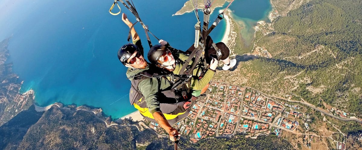 I DID IT!!! (I was very nervous haha)
Paragliding over Ölüdeniz. 
I used Sky Sports Paragliding and would definitely recommend them. See their website here: http://skysports-turkey.com/en/our-company/
I booked via our Thomson rep and got a discount when purchasing the photographs/videos (Approx 100 photos and 5 videos for 120TL (£30!))