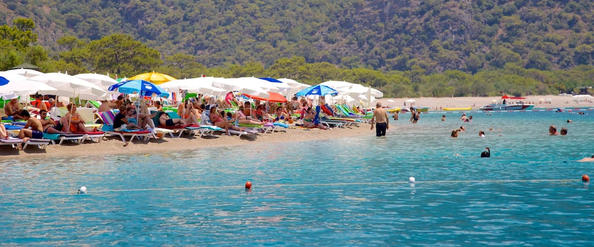 Oludeniz showing swimming and a sandy beach