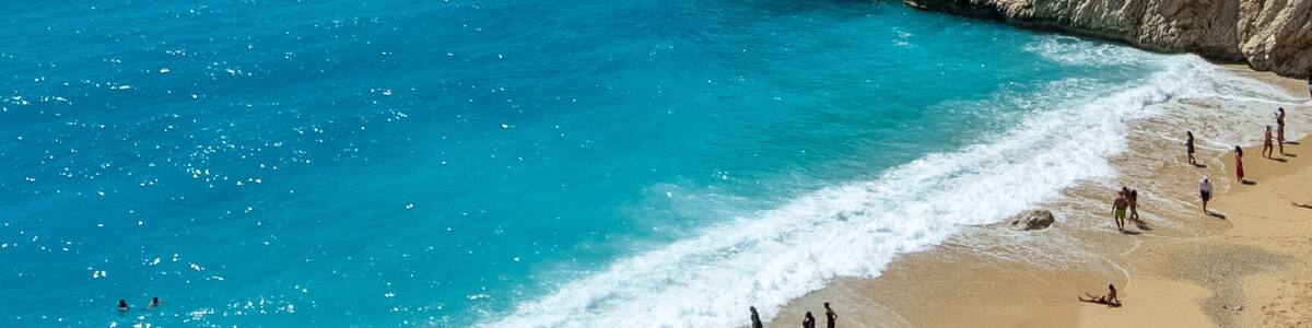 Aerial view of Kaputaş Beach, a famous beach with its turquoise water meets a small sandy-pebble beach between Kaş and Kalkan, Antalya, Turkey.