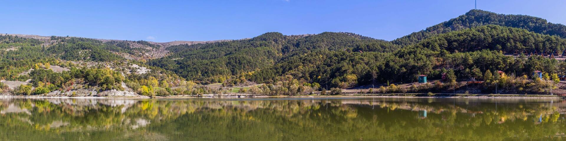 Cubuk Lake in Goynuk District of Bolu, Turkey. Beautiful lake view with windmills.