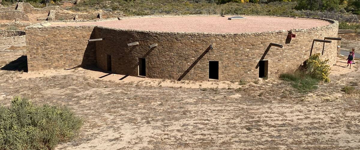 Great Kiva at Aztec Ruins National Monument in New Mexico. Best preserved Chacoan structures including Aztec West great house built by ancestral Pueblo people. Reconstructed kiva, religious site.