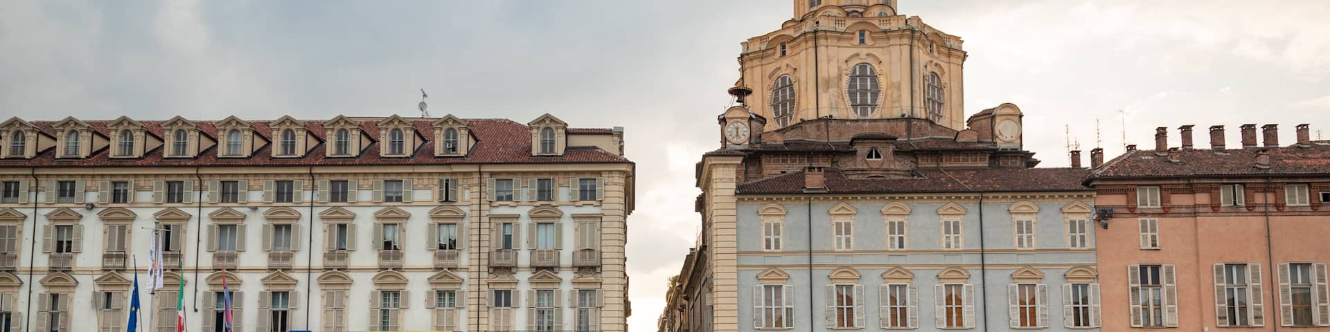 Piazza Castello which includes a square or plaza, street scenes and heritage architecture