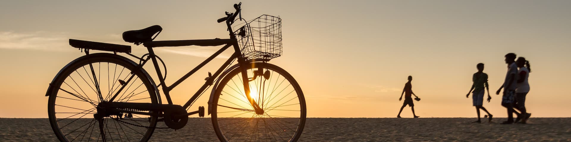 Bicycle Standing on the Beach During Sunset in Hikkaduwa, Sri Lanka