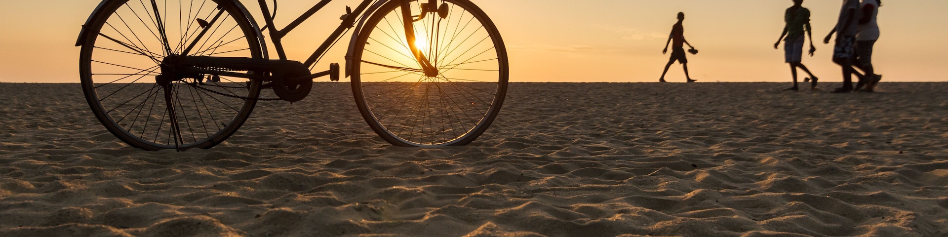 Bicycle Standing on the Beach During Sunset in Hikkaduwa, Sri Lanka