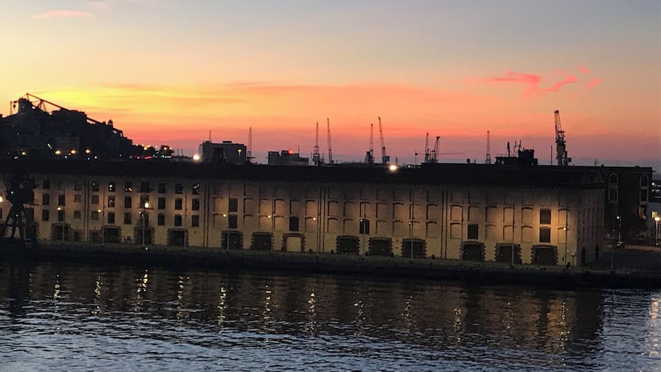 Sailing into dock beautiful sunrise Genoa Italy