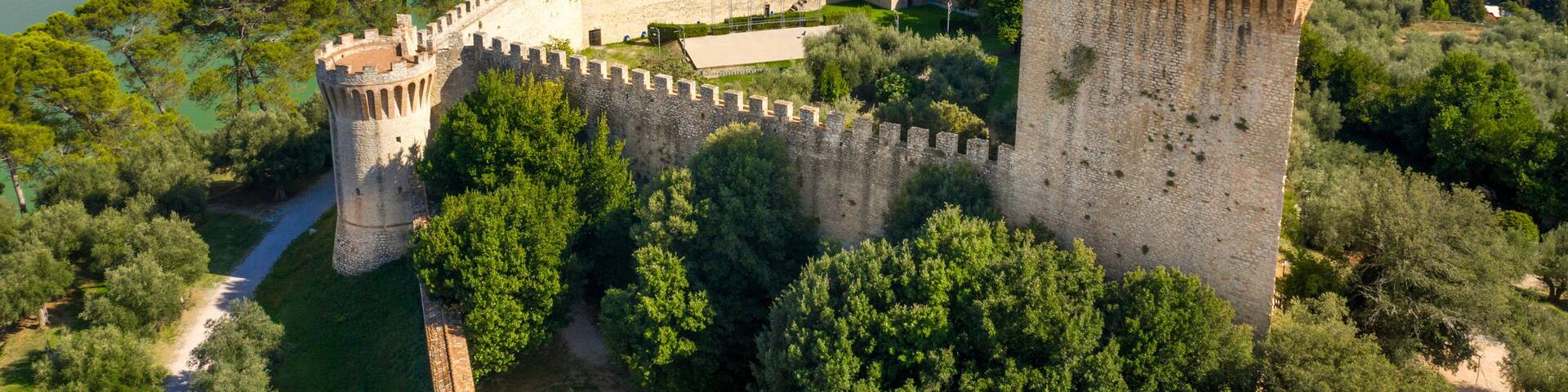 Aerial view on Fortress of the Lion in historical center of Castiglione del Lago, in Umbria, Italy. The castle is now used for events and is located on Lake Trasimeno in the province of Perugia.