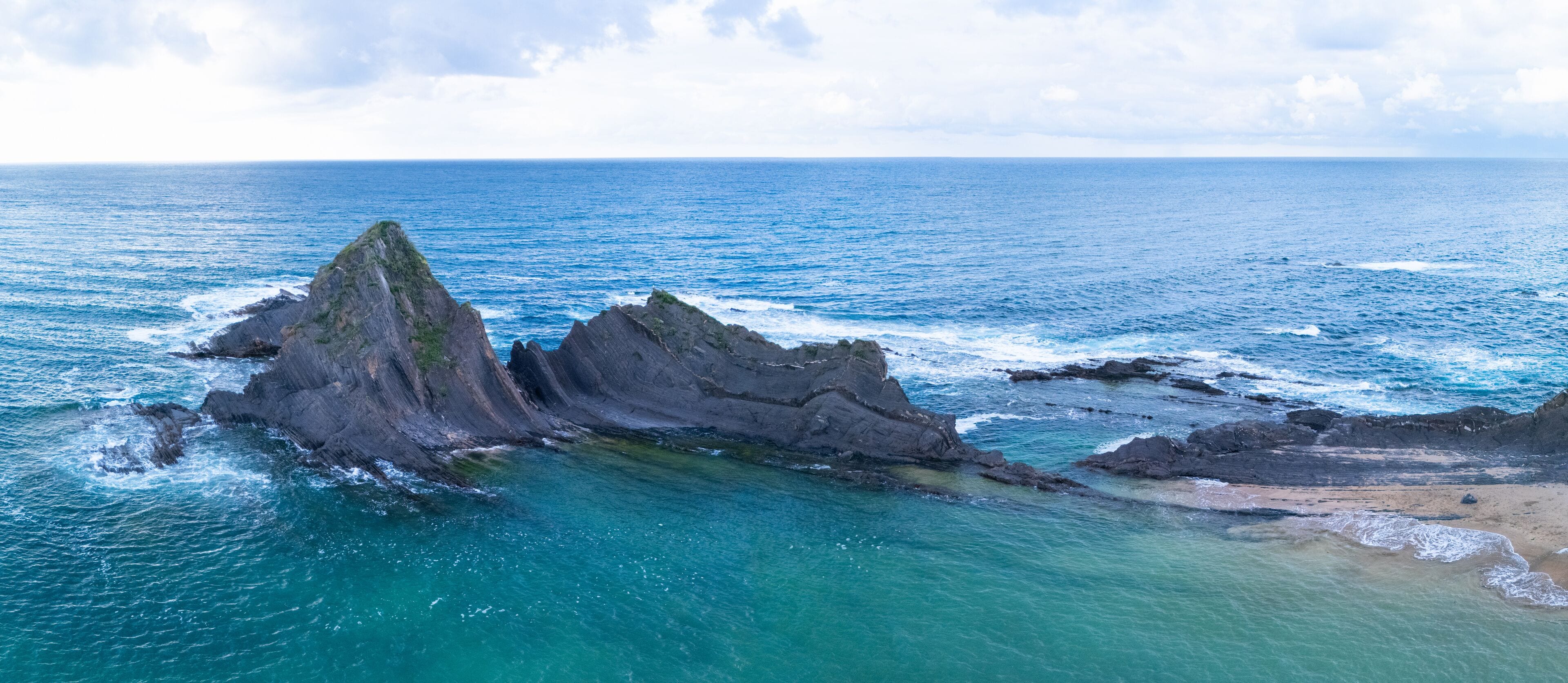 Aerial view from a drone of the Motrico flysch or Black Flysch between Deba and Saturraran Beach in the town of Motrico, in the province of Gipuzkoa, Basque Country, Spain. Europe