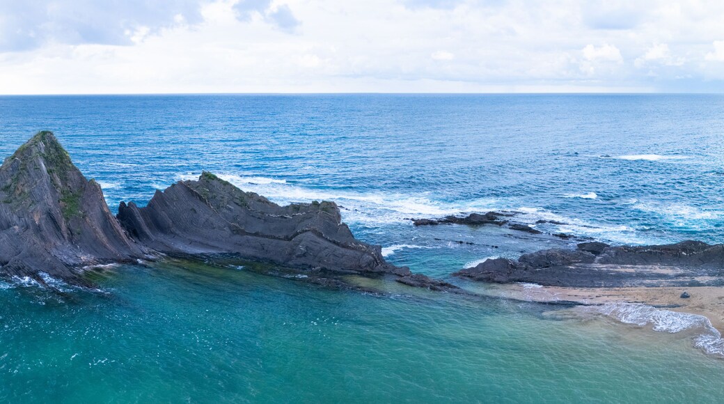 Aerial view from a drone of the Motrico flysch or Black Flysch between Deba and Saturraran Beach in the town of Motrico, in the province of Gipuzkoa, Basque Country, Spain. Europe