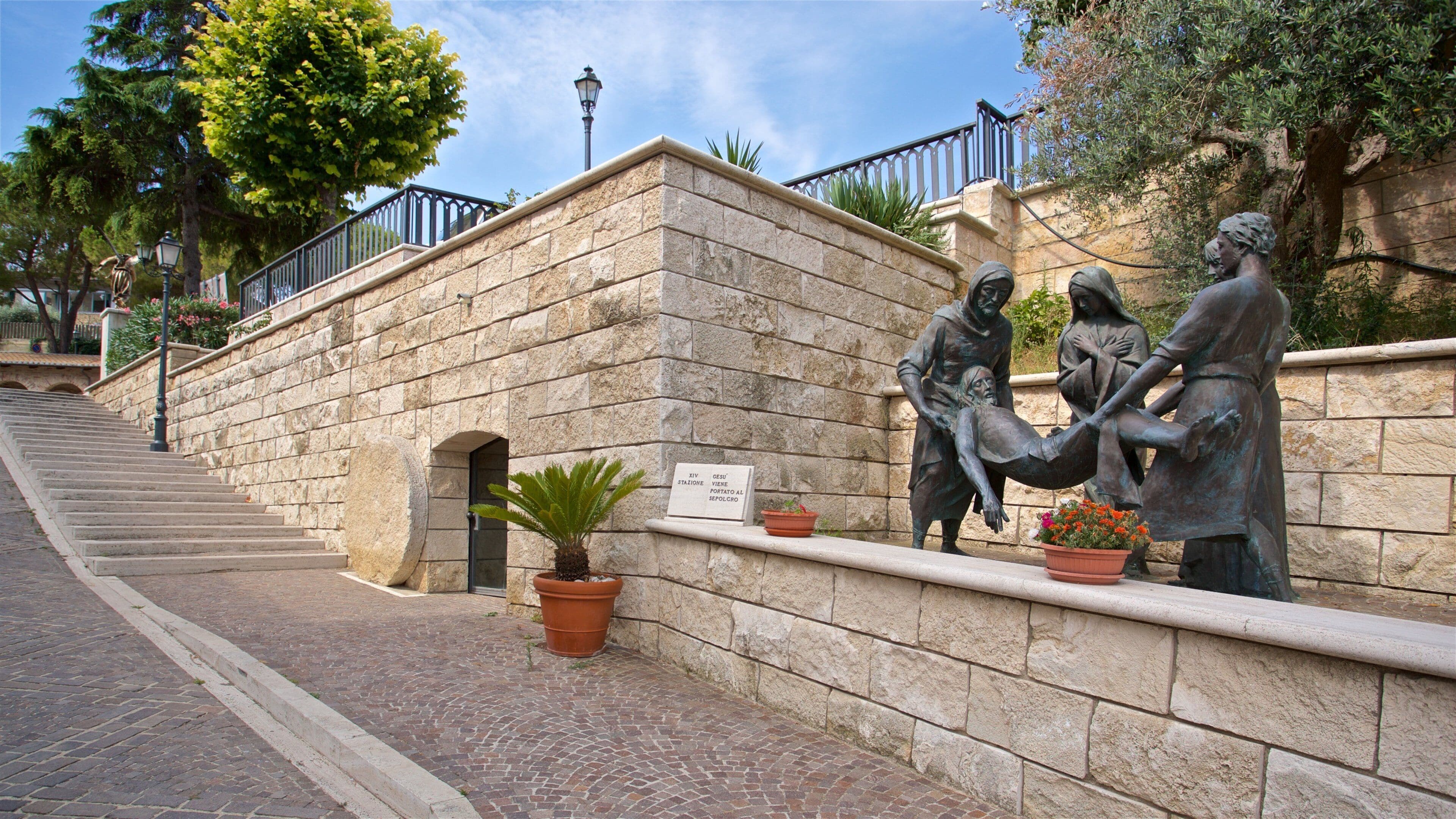 Dello Splendore Museum which includes flowers and a statue or sculpture