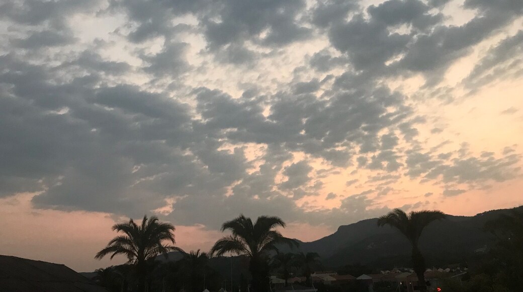 Enjoying a warm evening watching sunset on the beach while enjoying a nice cold drink Turkey is an amazing place friendly people great weather