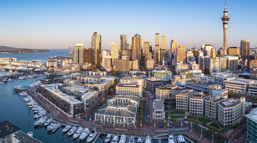 Aerial: Panoramic view of Auckland city skyline from viaduct harbour, New Zealand