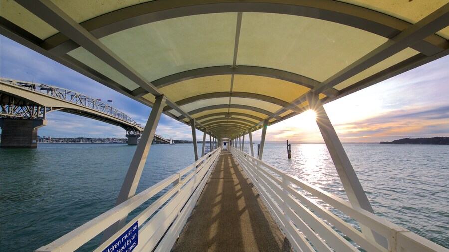 Harbour Bridge which includes a bay or harbour, a sunset and a bridge