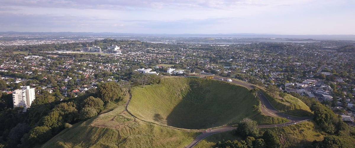 Mount Eden, Auckland / New Zealand - December 10, 2019: The Legendary Volcano location of Mount Eden and the skyline of Auckland