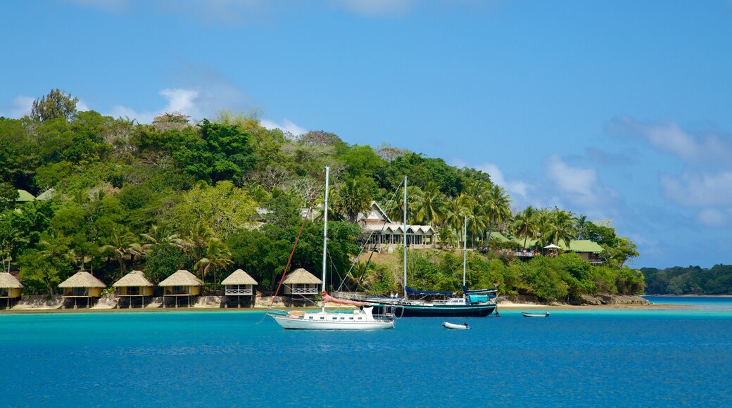 Iririki Island featuring general coastal views, tropical scenes and a small town or village