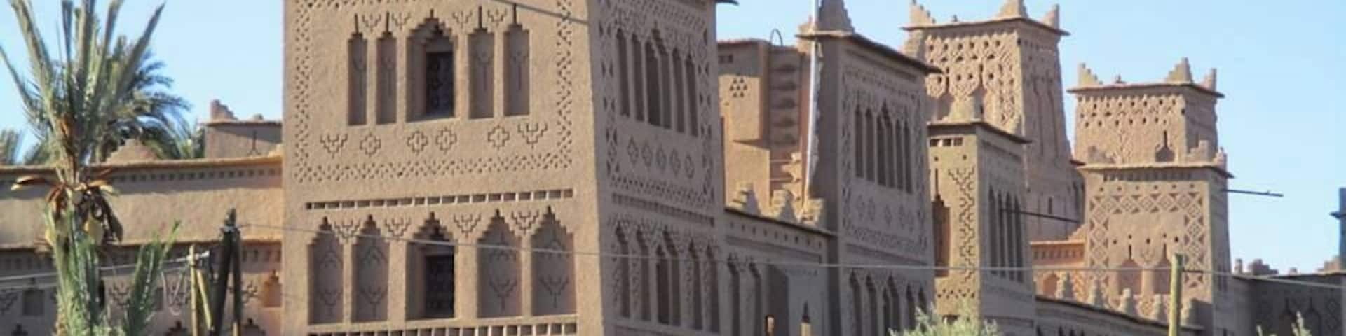 This 17th century kasbah gave the impression of being a huge sand castle. It is made of rammed earth and is the most ornately decorated mud building that I saw in Morocco. Its also featured on Morocco's 50 dirham ($5) bill.
www.journeybeyondtravel.com/blog/kasbah-amridil-skoura-morocco.html
https://davenotravels.blog