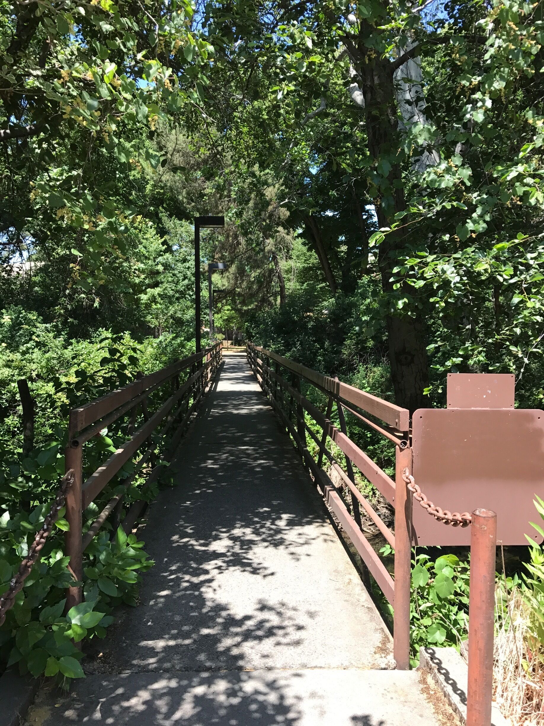 Over this bridge and to the right is the Rose Garden 