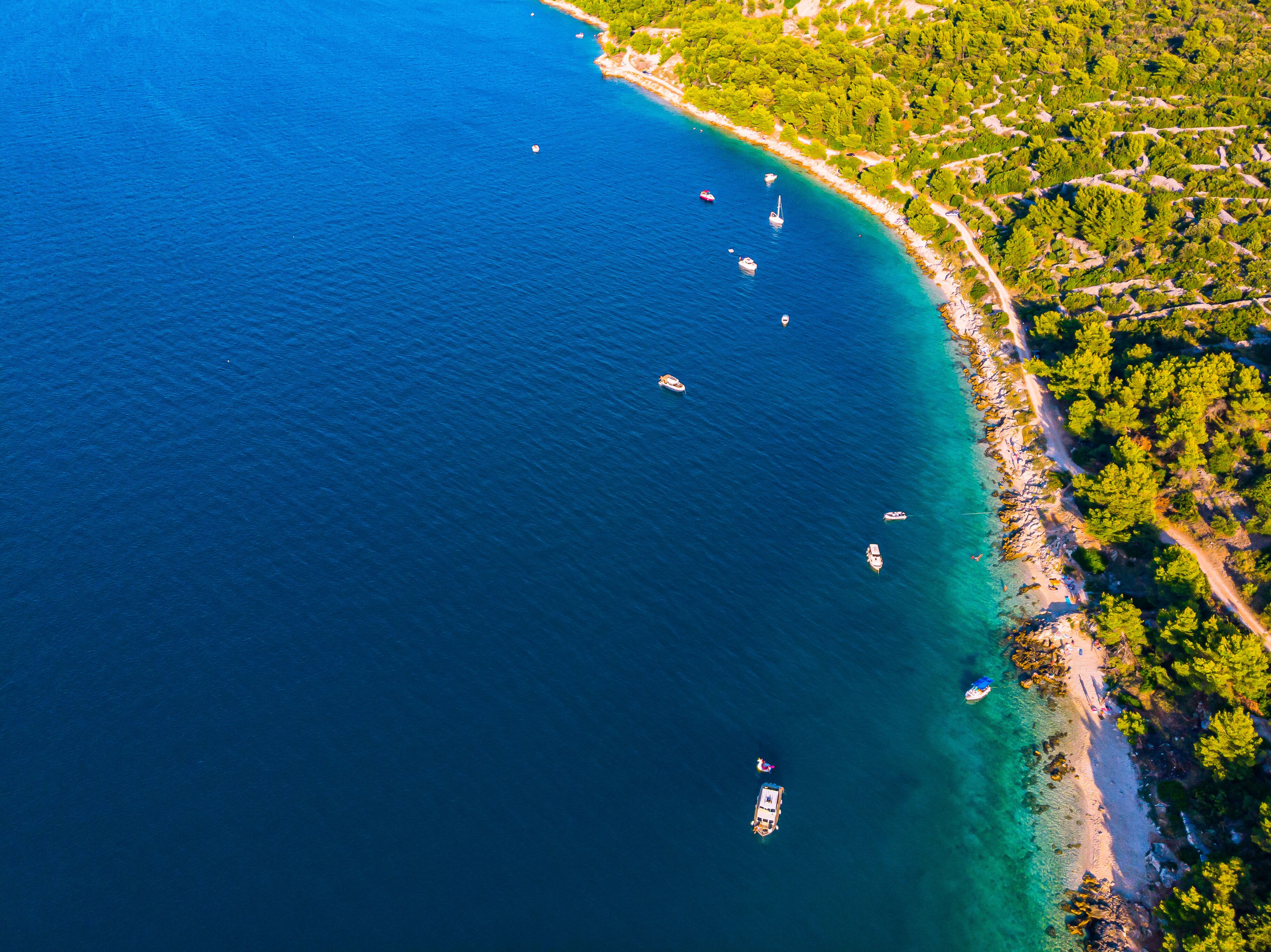 Sailing boats near paradise beach in ciovo island