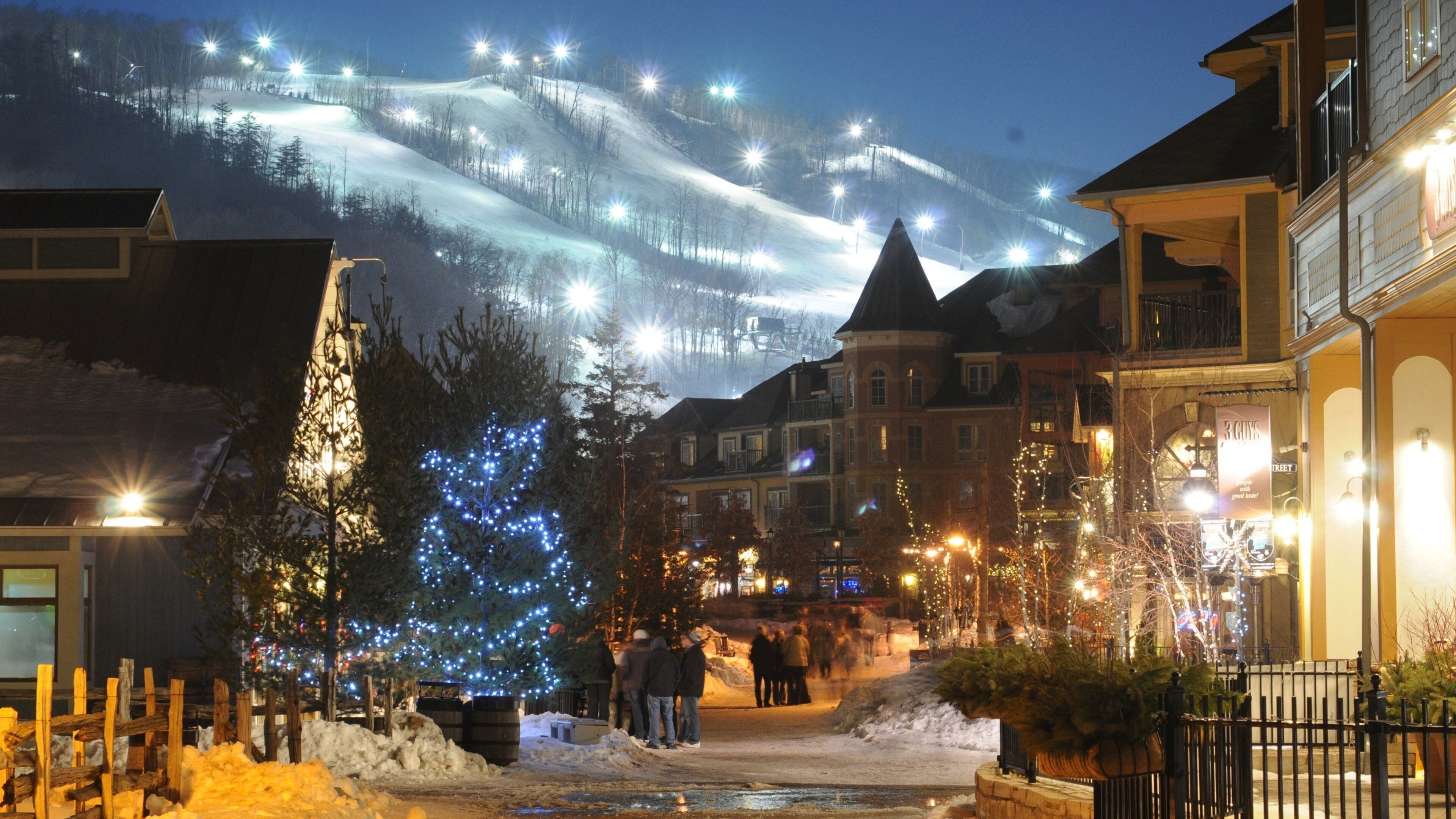 Blue Mountain Ski Resort which includes a small town or village, street scenes and snow