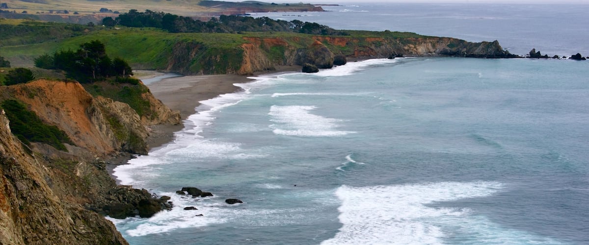 Ragged Point which includes landscape views, rugged coastline and a bay or harbour
