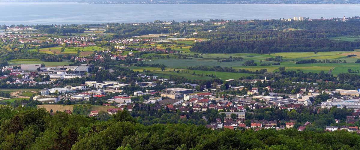 View from Gehrenberg to Markdorf with neighboring communities, Germany. In the background Lake Constance and the Swiss Alps