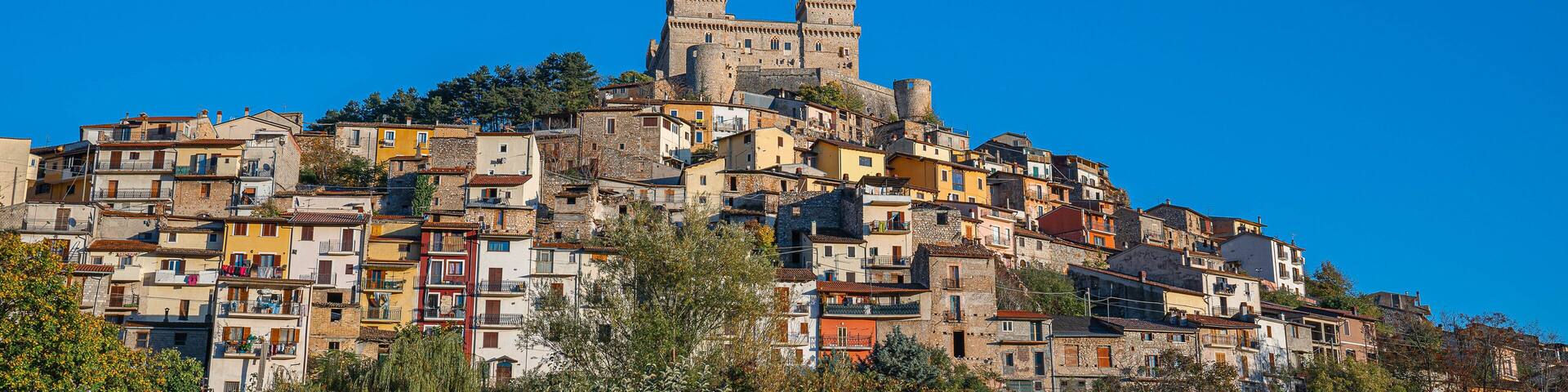 Cityscape with medieval castel Piccolomini at Celano in Abruzzo, Italy