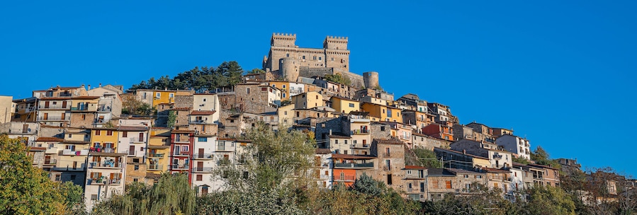 Cityscape with medieval castel Piccolomini at Celano in Abruzzo, Italy