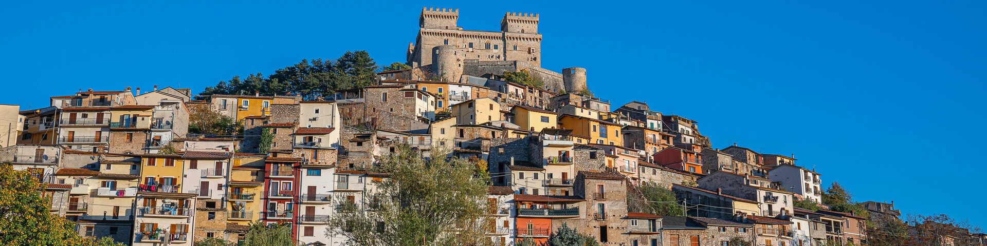 Cityscape with medieval castel Piccolomini at Celano in Abruzzo, Italy