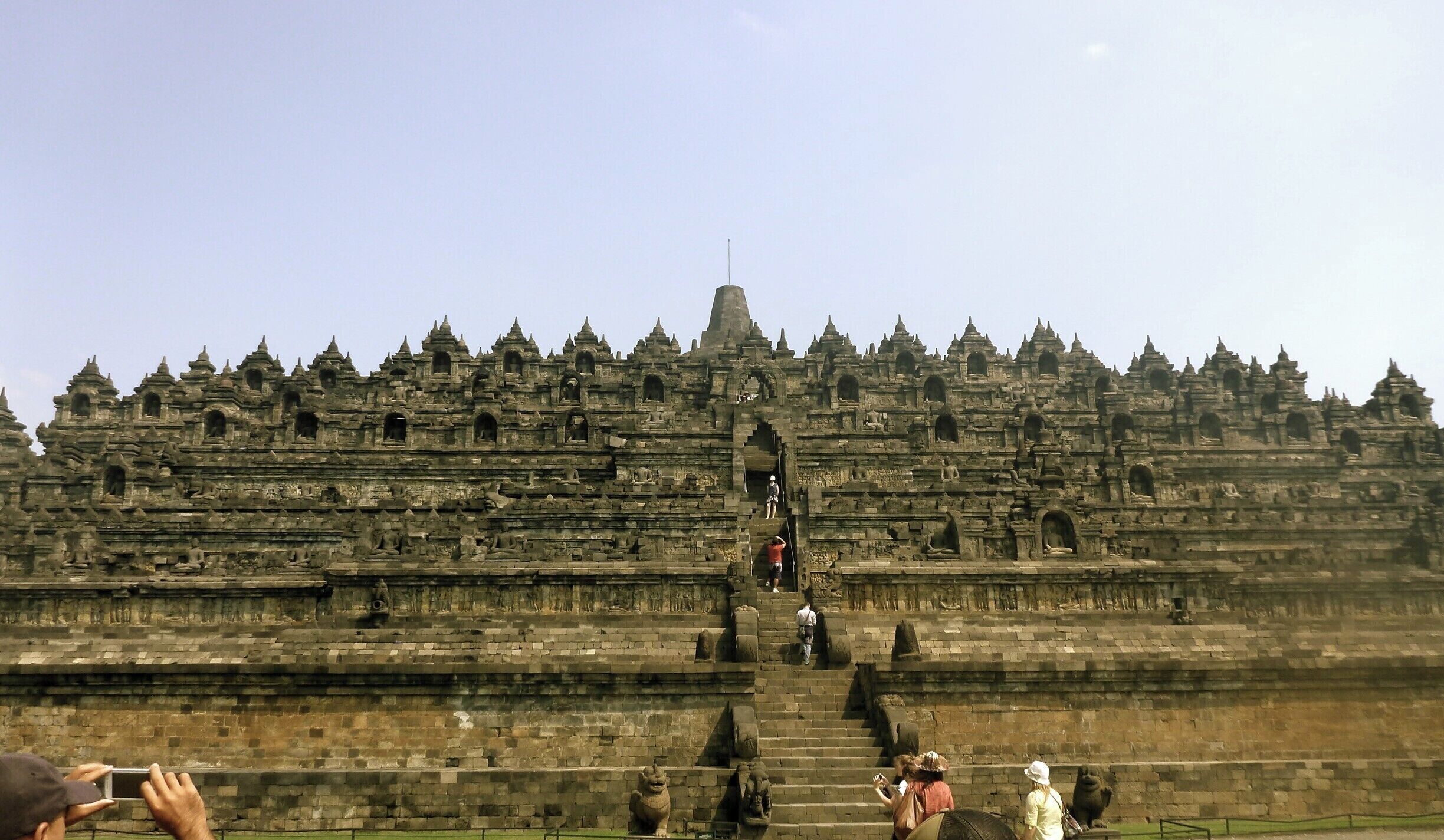 Borobudur, or Barabudur, is a 9th-century Mahayana Buddhist Temple in Magelang, Central Java, Indonesia. 

The monument consists of six square platforms topped by three circular platforms and is decorated with 2,672 relief panels and 504 Buddha statues. A main dome, located at the center of the top platform, is surrounded by 72 Buddha statues each of which is seated inside a perforated stupa. 

It is the world’s largest Buddhist temple, as well as one of the greatest Buddhist monuments in the world.

-thank you, #wikipedia

#indonesia #java