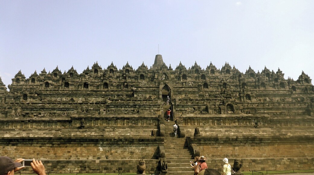 Borobudur, or Barabudur, is a 9th-century Mahayana Buddhist Temple in Magelang, Central Java, Indonesia.
The monument consists of six square platforms topped by three circular platforms and is decorated with 2,672 relief panels and 504 Buddha statues. A main dome, located at the center of the top platform, is surrounded by 72 Buddha statues each of which is seated inside a perforated stupa.
It is the world’s largest Buddhist temple, as well as one of the greatest Buddhist monuments in the world.
-thank you, #wikipedia
#indonesia #java