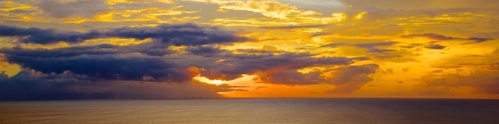 Senggigi featuring a sunset and landscape views