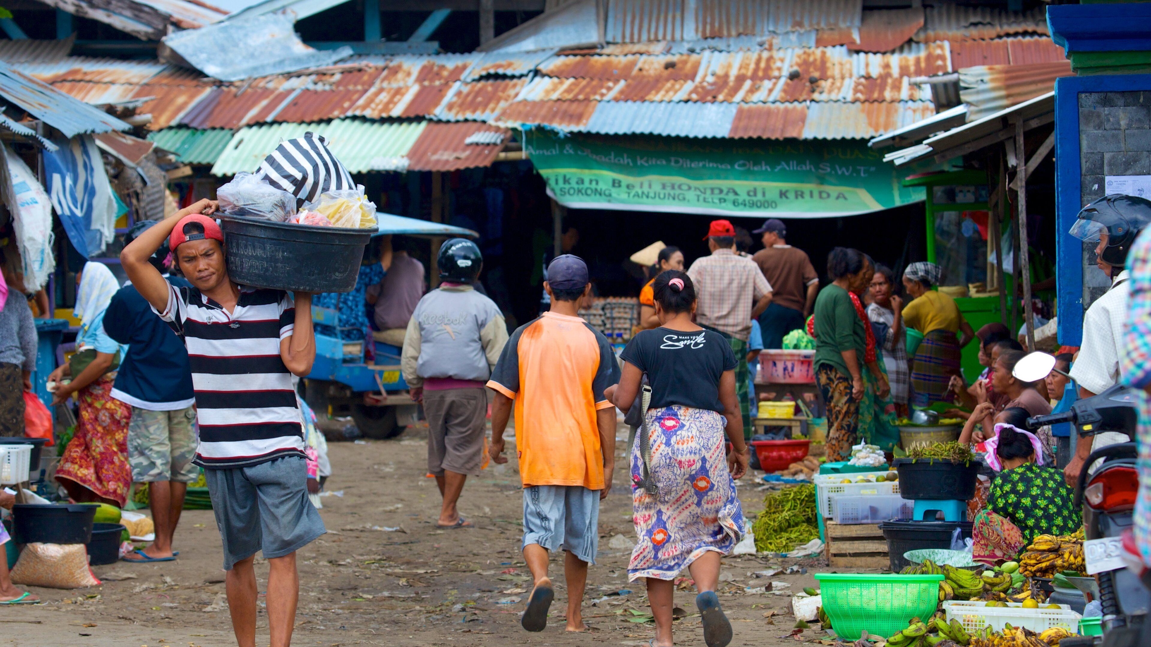 Tanjung which includes street scenes, markets and a small town or village