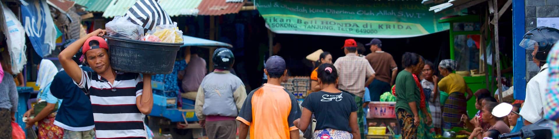 Tanjung which includes street scenes, markets and a small town or village