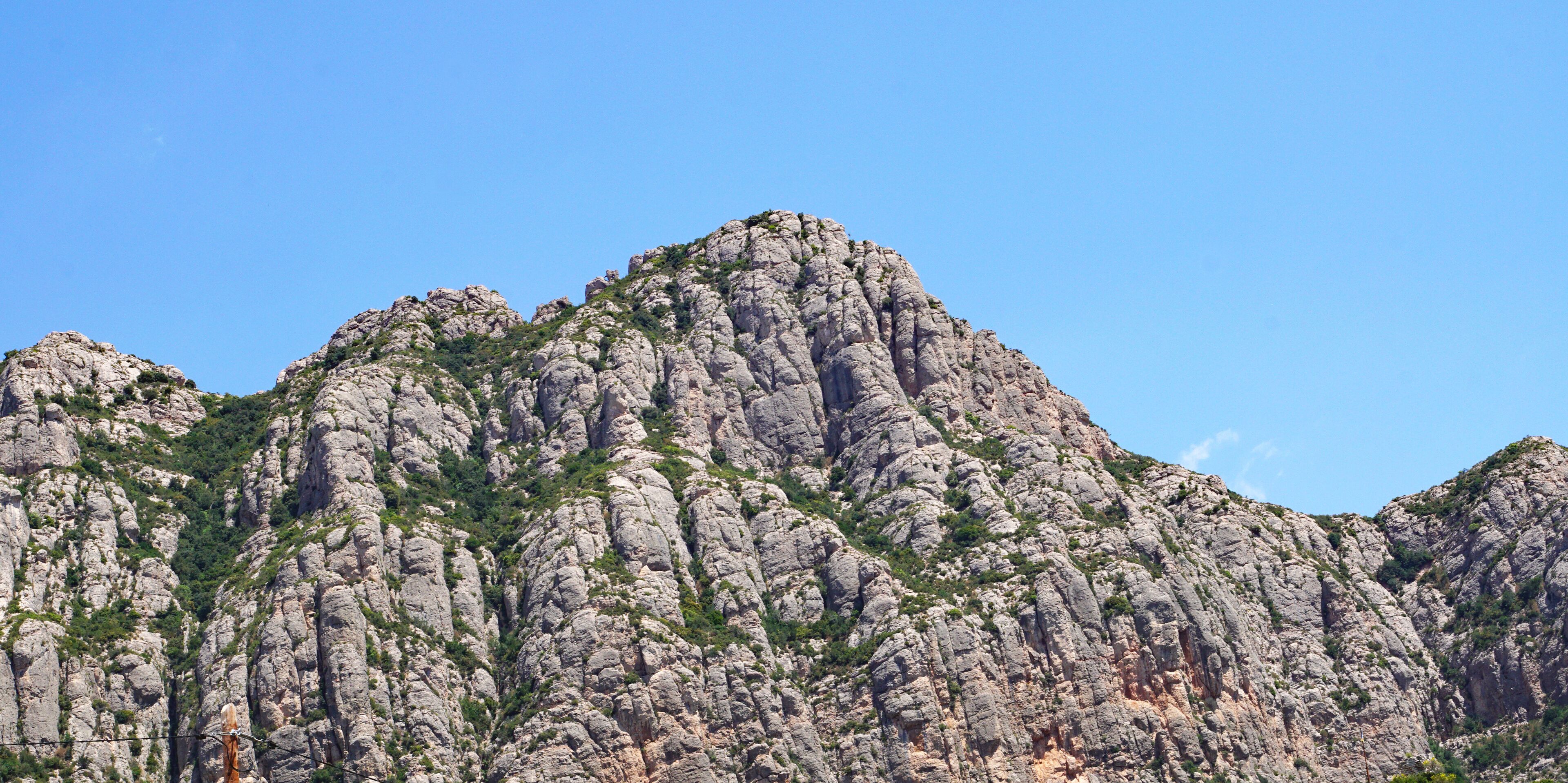 Vista de las montañas de Montserrat con ermita de la salud  desde Collbato en Barcelona, Catalunya, España, Europa
