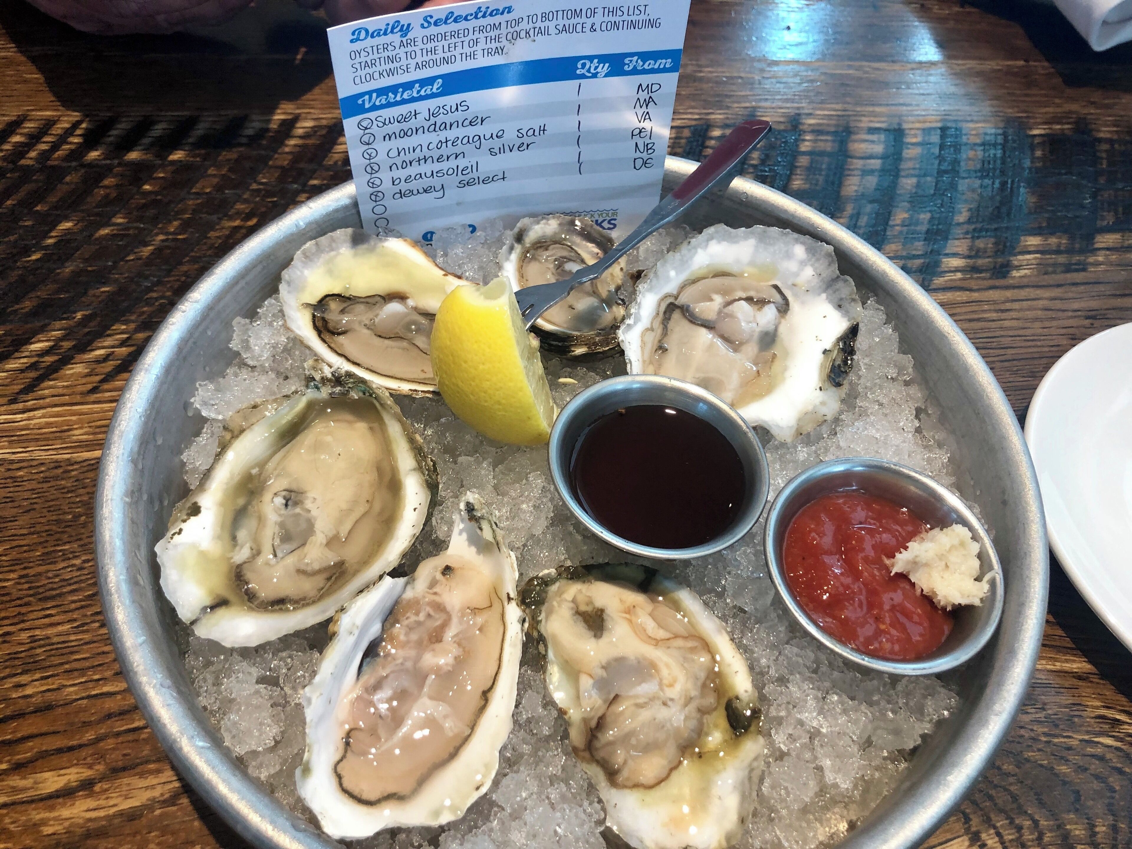 Sampler 1/2 dozen raw oysters. They were from Maryland, Massachusetts, Virginia, Prince Edward Island, New Brunswick and Delaware. Each one was different and they were all excellent!