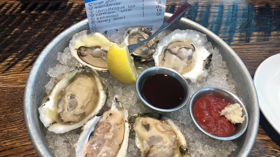 Sampler 1/2 dozen raw oysters. They were from Maryland, Massachusetts, Virginia, Prince Edward Island, New Brunswick and Delaware. Each one was different and they were all excellent!