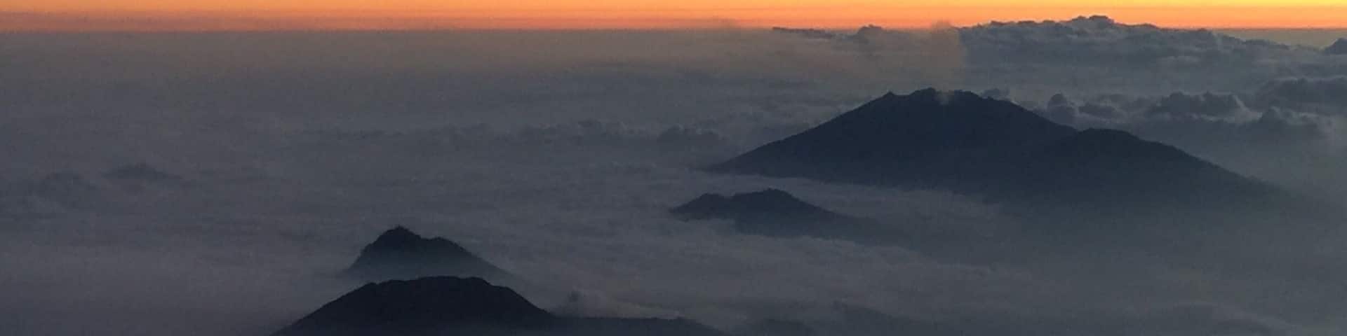 The volcano (right) that is still spewing ashes and causing delays and closures at Bali airport with over few hundred of flights affected in recent weeks.
I took this photo with the iPhone 6+ on my return flight from Singapore after the #weekendgetaway in celebration of Singapore's 50th Independence Day.