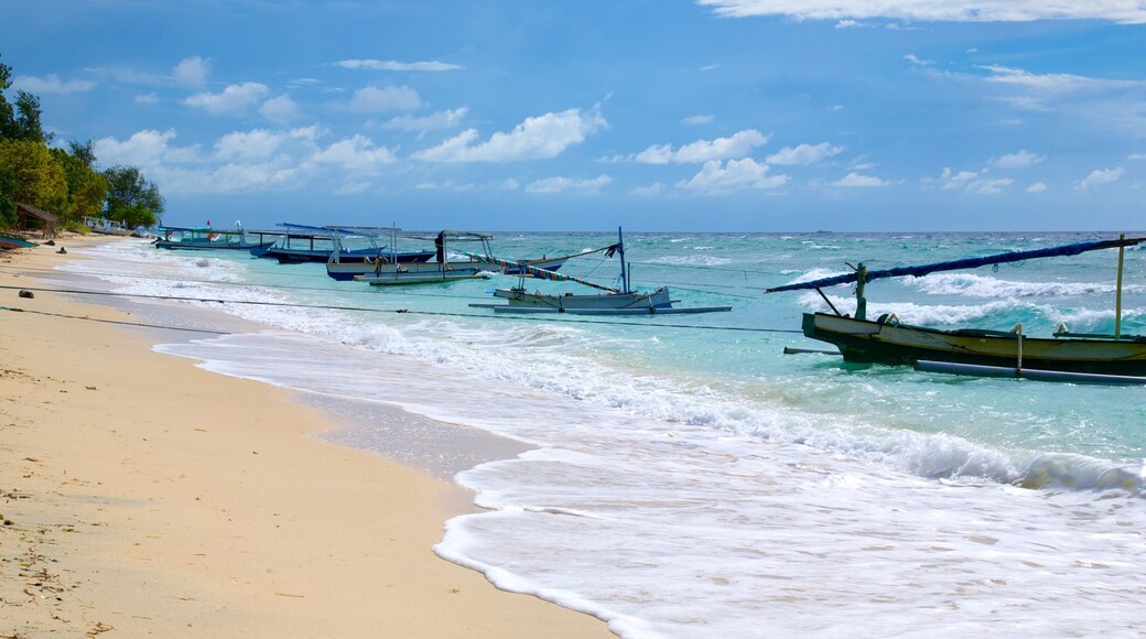 Gili-øyene som viser båter og sandstrand