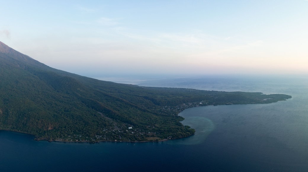 Daybreak illuminates the peak of Iliape volcano on Lembata Island in the Lesser Sunda Islands of Indonesia. This scenic volcano has been extremely active since 2024.