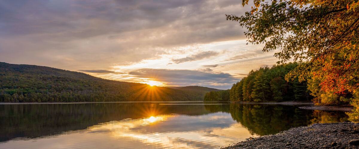 Roundout Resevoir in Catskill mountains of New York in sunset time. Colorful trees and calm lake