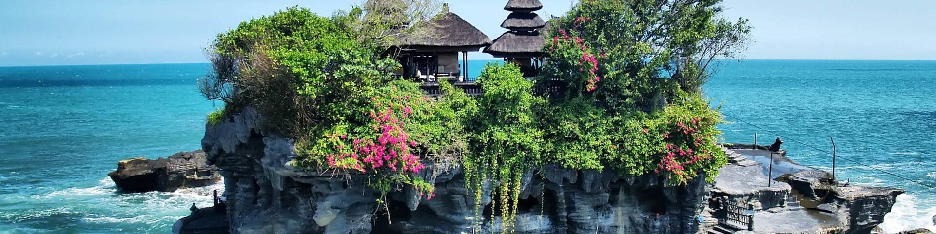 Tanah Lot featuring island views and general coastal views