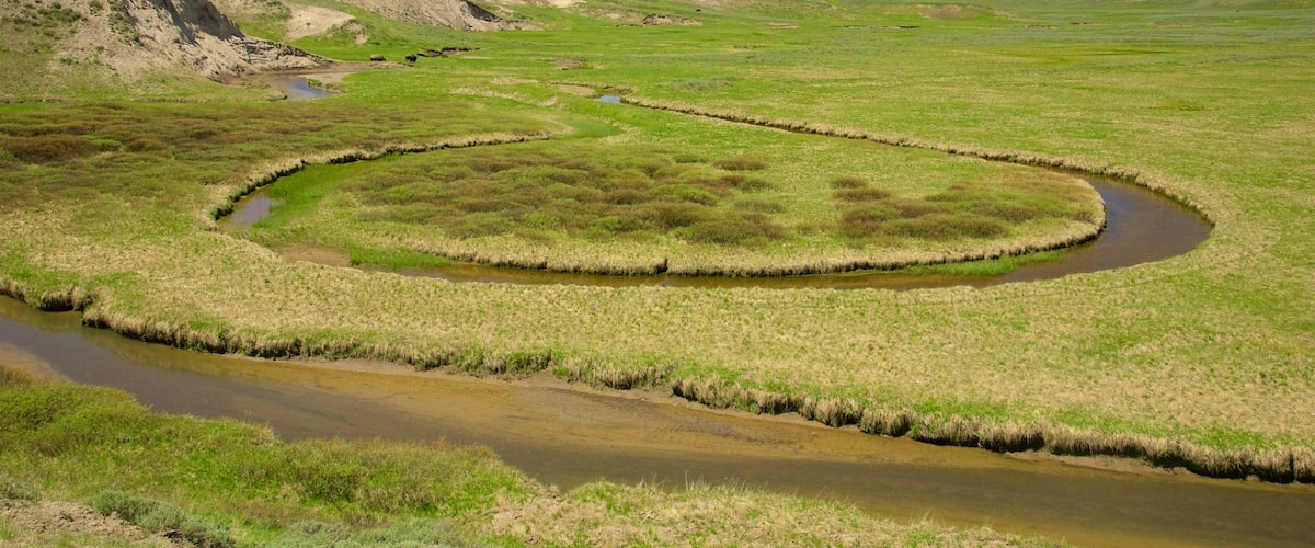 Nordvestlige Wyoming som viser en flod eller et vandløb, udsigt over landskaber og fredfyldte omgivelser