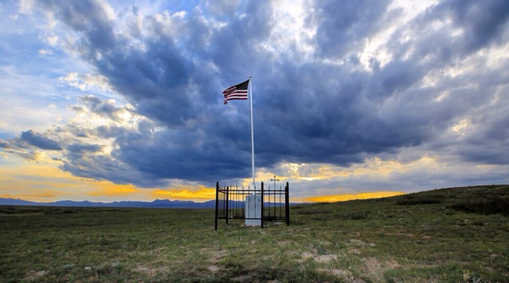 Patrolman Chris Logsdon was killed in a vehicle accident after being run off the road by another driver. He was responding to a call of the drunk driver on Interstate 25 north of Wheatland. When he arrived on the scene the suspect vehicle was driving towards him on the wrong side of the road.
Patrolman Logsdon swerved to avoid an accident, causing his Camaro police cruiser to flip several times. He was pronounced dead at the scene. The suspect turned out to not being a drunk driver, but rather a 92-year-old man who was confused.
Patrolman Logsdon is survived by his wife and four children.