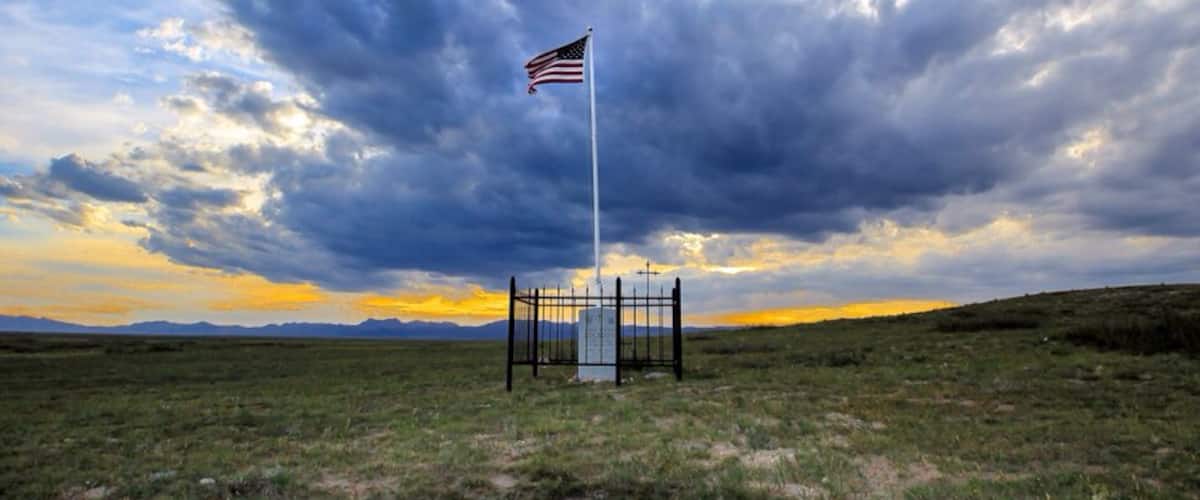 Patrolman Chris Logsdon was killed in a vehicle accident after being run off the road by another driver. He was responding to a call of the drunk driver on Interstate 25 north of Wheatland. When he arrived on the scene the suspect vehicle was driving towards him on the wrong side of the road.
Patrolman Logsdon swerved to avoid an accident, causing his Camaro police cruiser to flip several times. He was pronounced dead at the scene. The suspect turned out to not being a drunk driver, but rather a 92-year-old man who was confused.
Patrolman Logsdon is survived by his wife and four children.