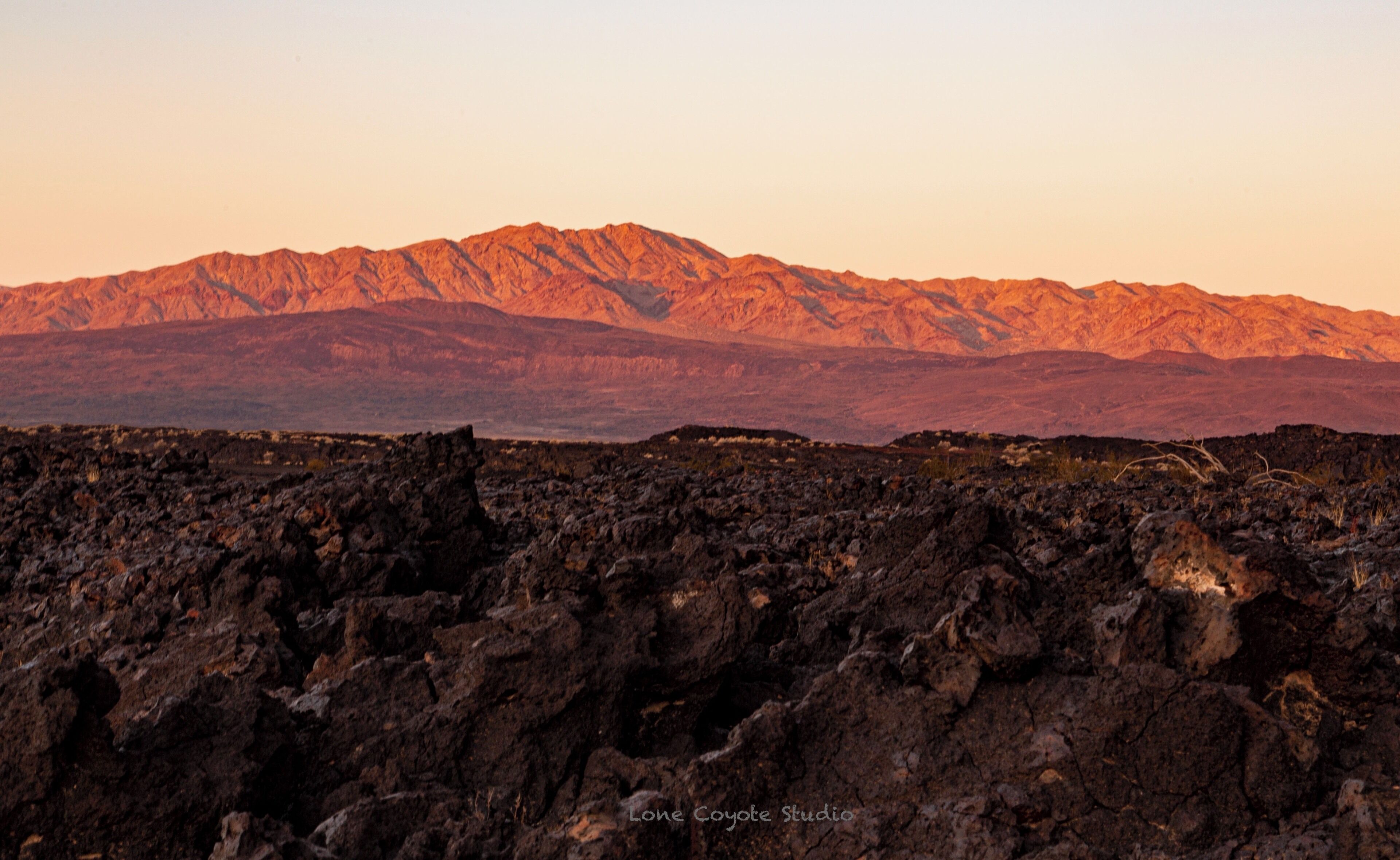 Once upon a time, there was an active volcano with lava flowing out of it in the middle of the Mohave Desert of California. If I didn't know any better it looks like it's about 100 years old. But after some research on my part, I learned that scientists put it at more like 8-10,000 years old. The older I get the more I realize that pre-judging anything or anyone doesn't get you anywhere.



#cindercone #mojavenationalpreserve #lonecoyotestudio #lavafield #nealdodson #wonderingphotographies #lavafields #mojaveoffroad #desertsunrise #desertlandscape #destinationphotography #thrivingchristianartists #destinationphotographers #geologyrocks #volcanoeruption #desertwildlife #route66roadtrip #historicroute66 #roadsidephotographies
#offroadphotography #offroadphotographer
#offroadphoto #mojavedesert #mojavedesertcalifornia #earlymorningwalk #earlymorninghikes #earlymorningphotography #earlymorningphotoshoot #desertmountain #desertmountains #desertsage #volcanology #desertadventures #lavarocks #lavatubes #ilavayou #lavayou #californialandscape #judgenoone