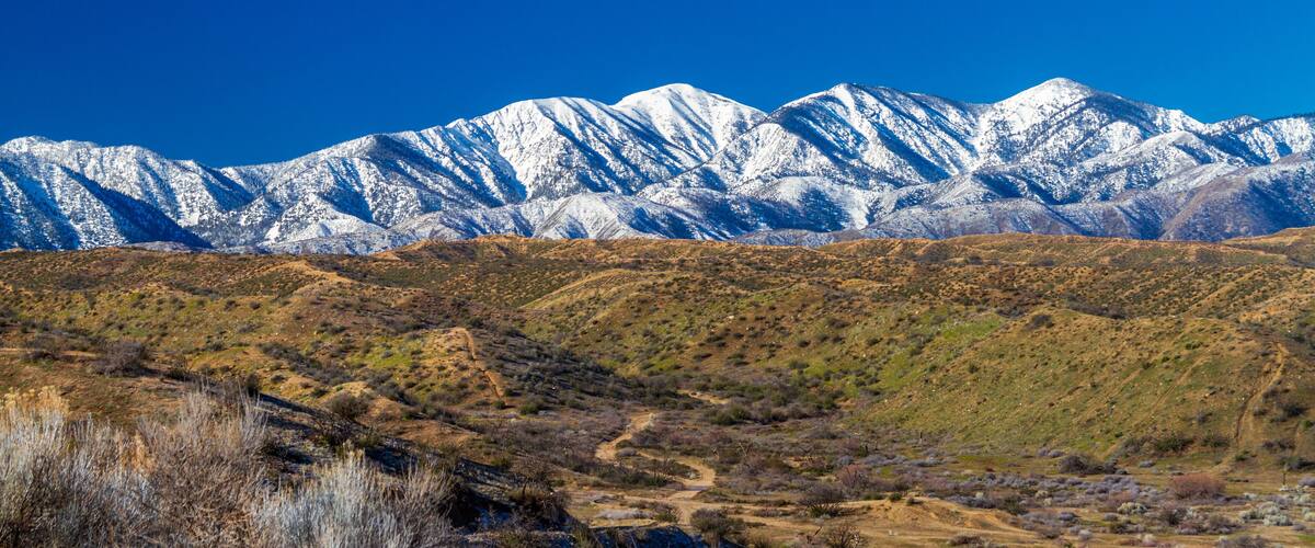 A mountainous landscape with a clear sky.